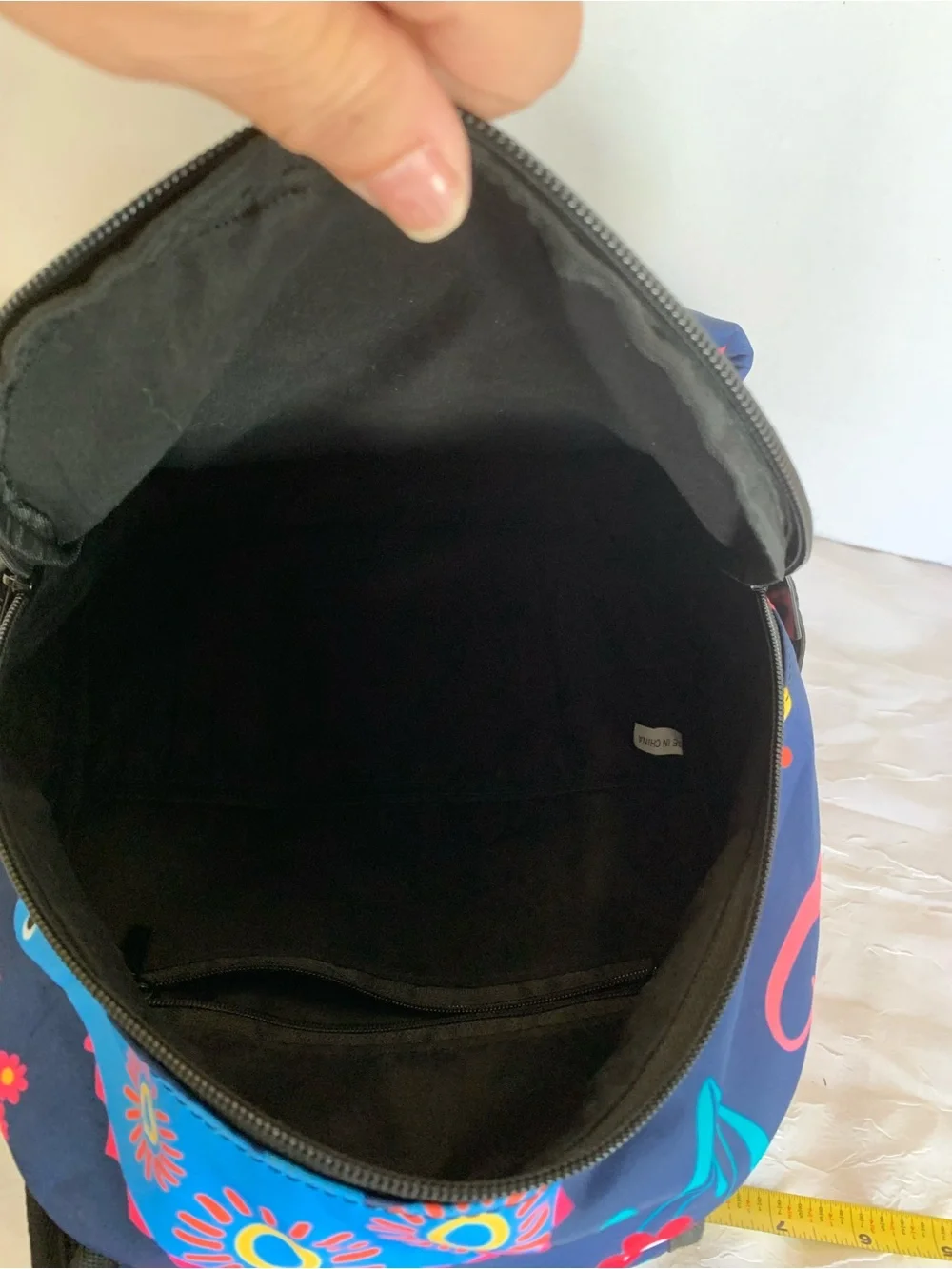 Child’s colorful dinosaur backpack